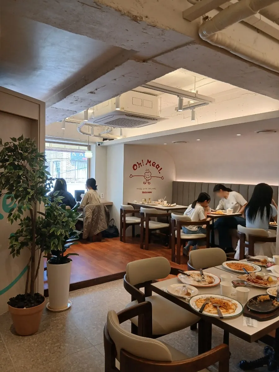 Window bar table seating overlooking Hyehwa street