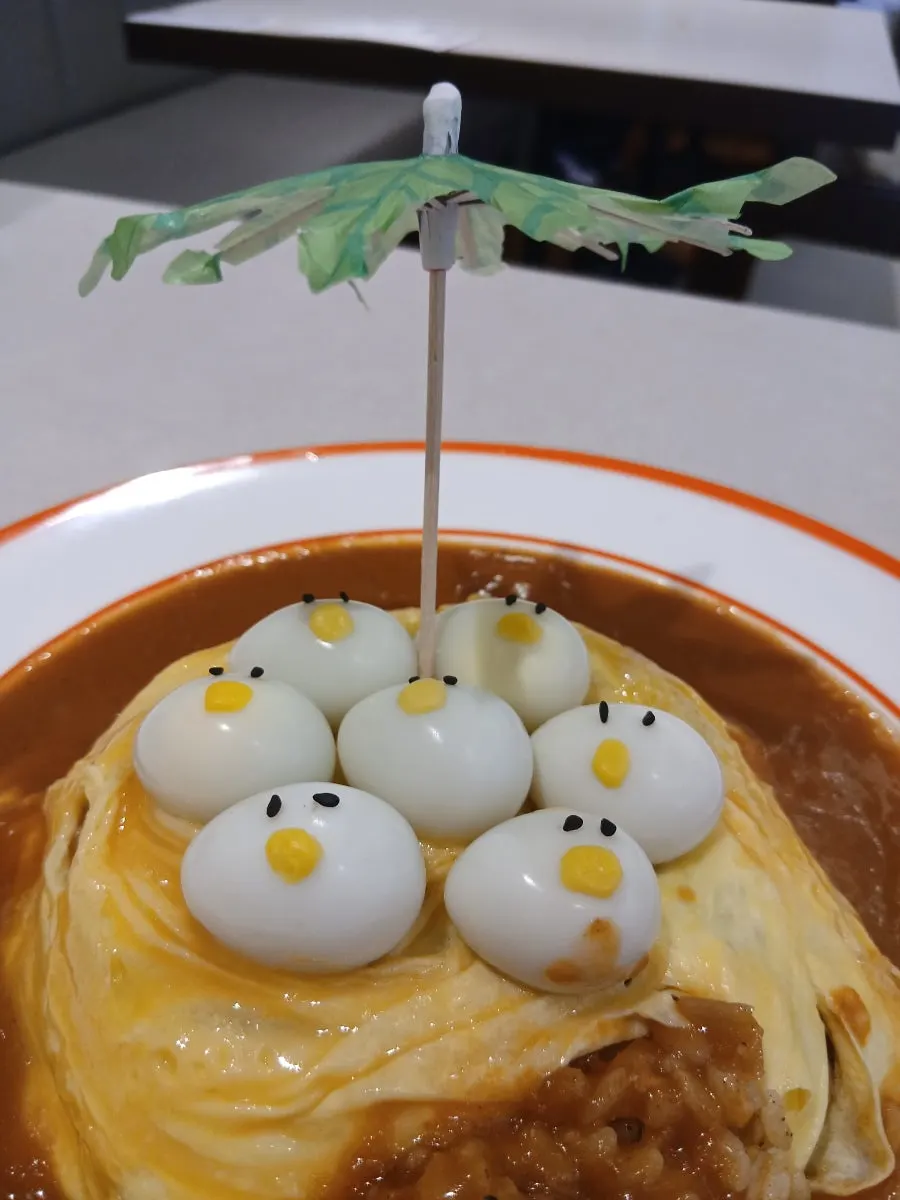 Rubber Duck omurice topped with quail-egg ducklings