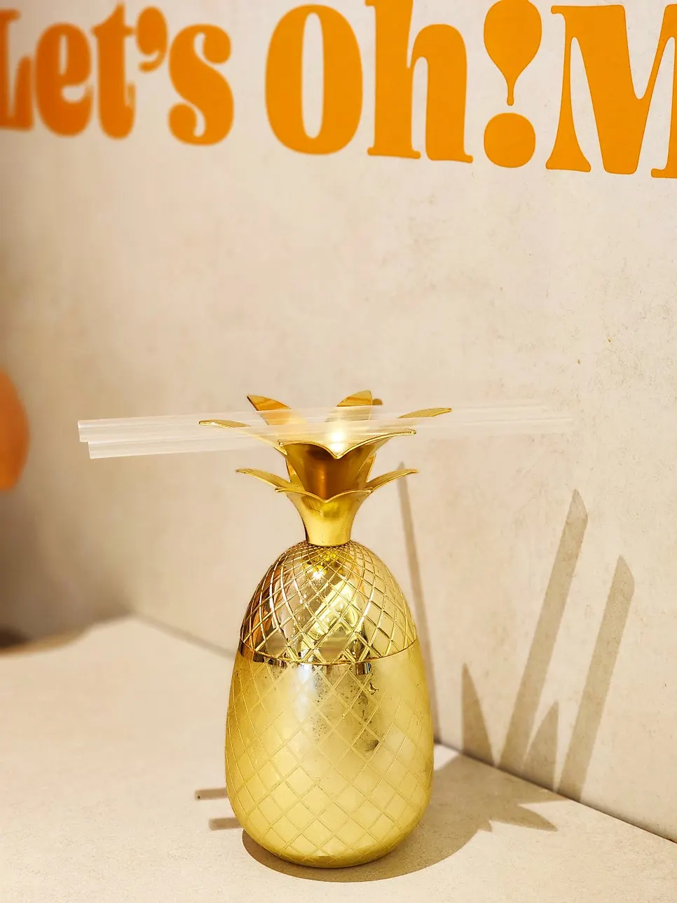 Omil's pineapple ade served in a pineapple-shaped glass