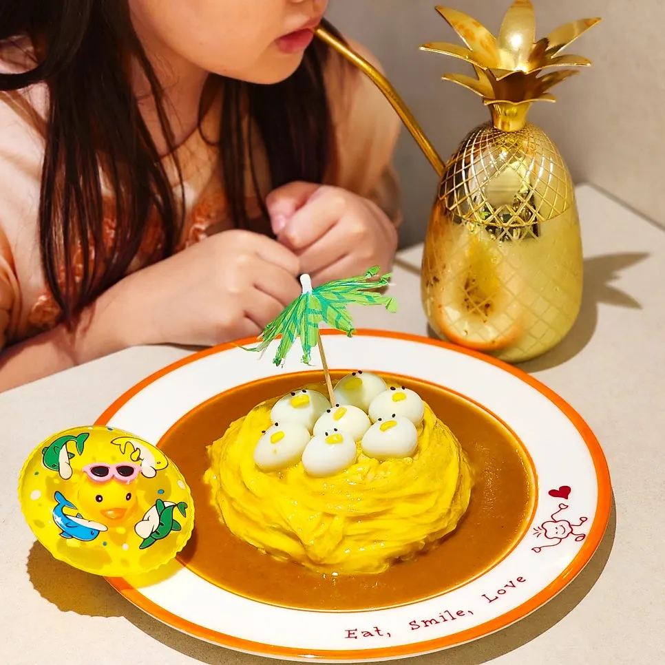 Cross-section of the omurice with swirled egg on top
