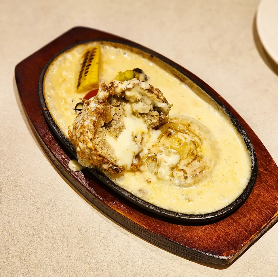 Cross-section of the cutlet with mozzarella cheese oozing out