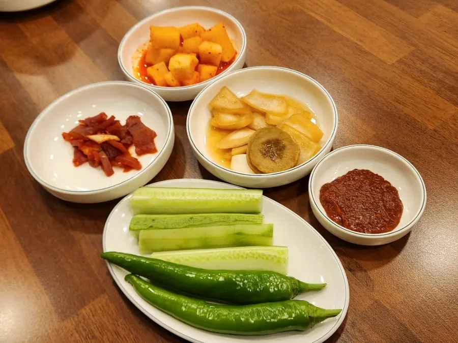 Herbal mung bean samgyetang served in a stone pot