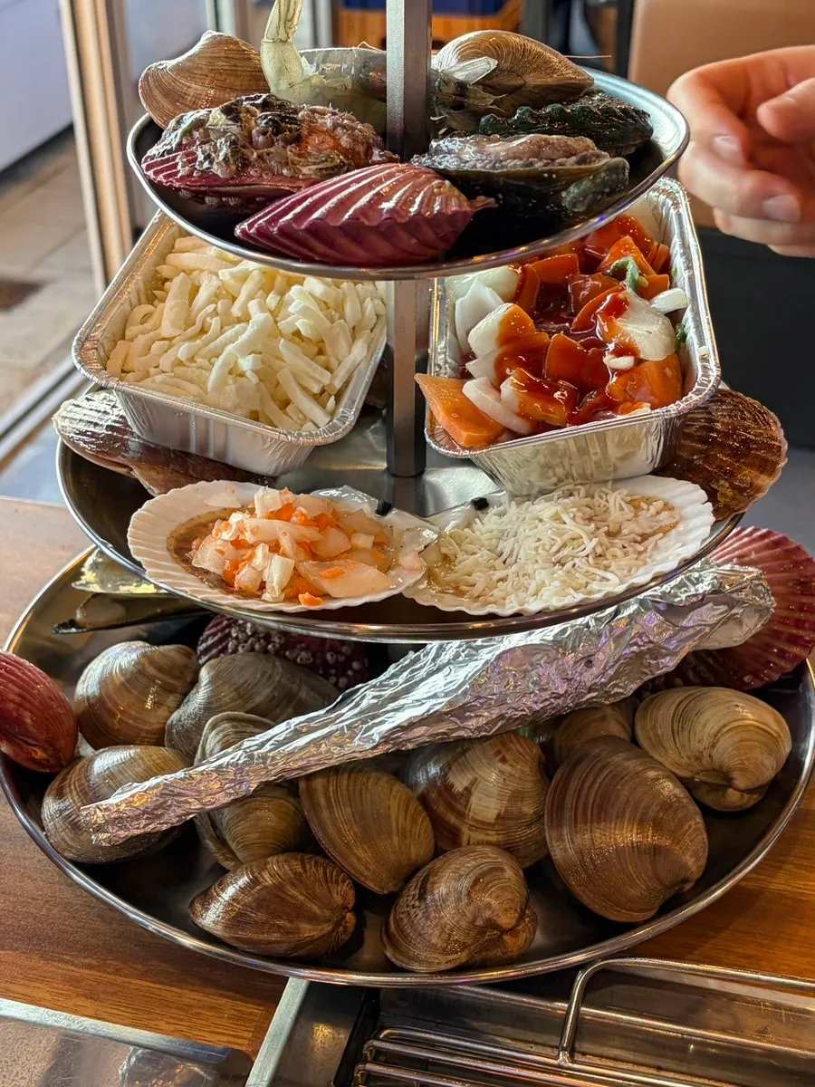 Top tier with shrimp, abalone, and scallops