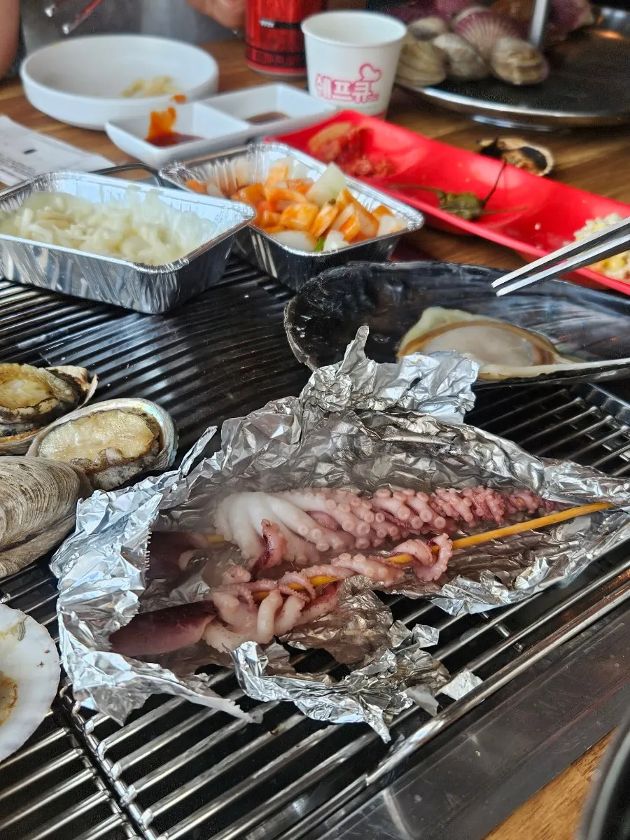 Octopus skewers served in foil