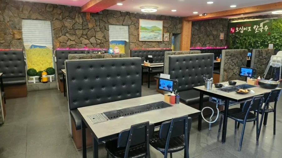 First-floor hall seating with stone walls