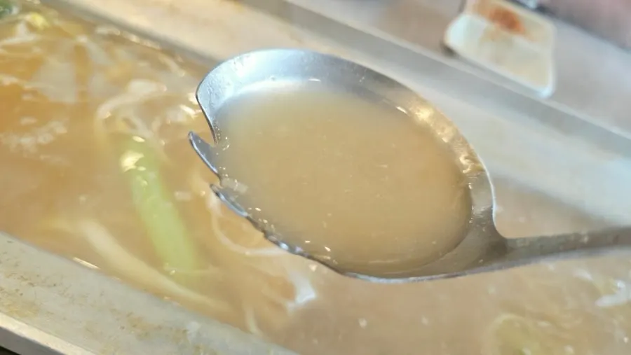 A bowl of kalguksu with rich broth