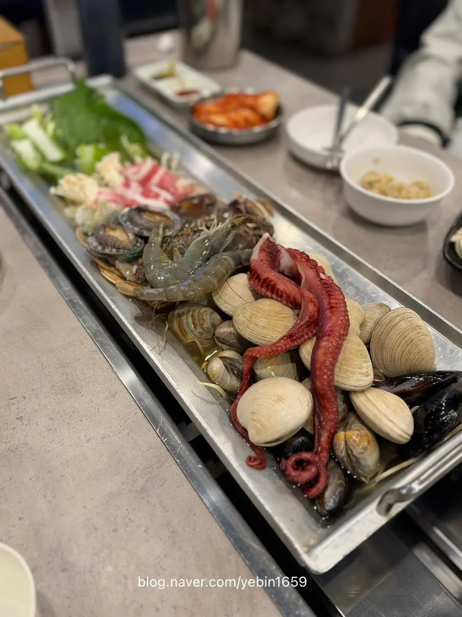 Seafood and vegetables cooking through