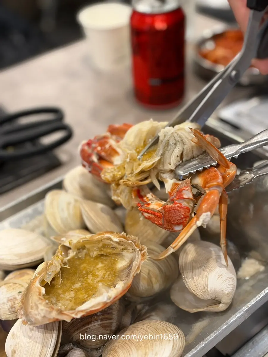 Picking out crab meat that was pre-cleaned for us