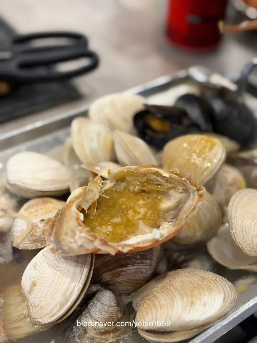 Close-up of the richly infused seafood broth