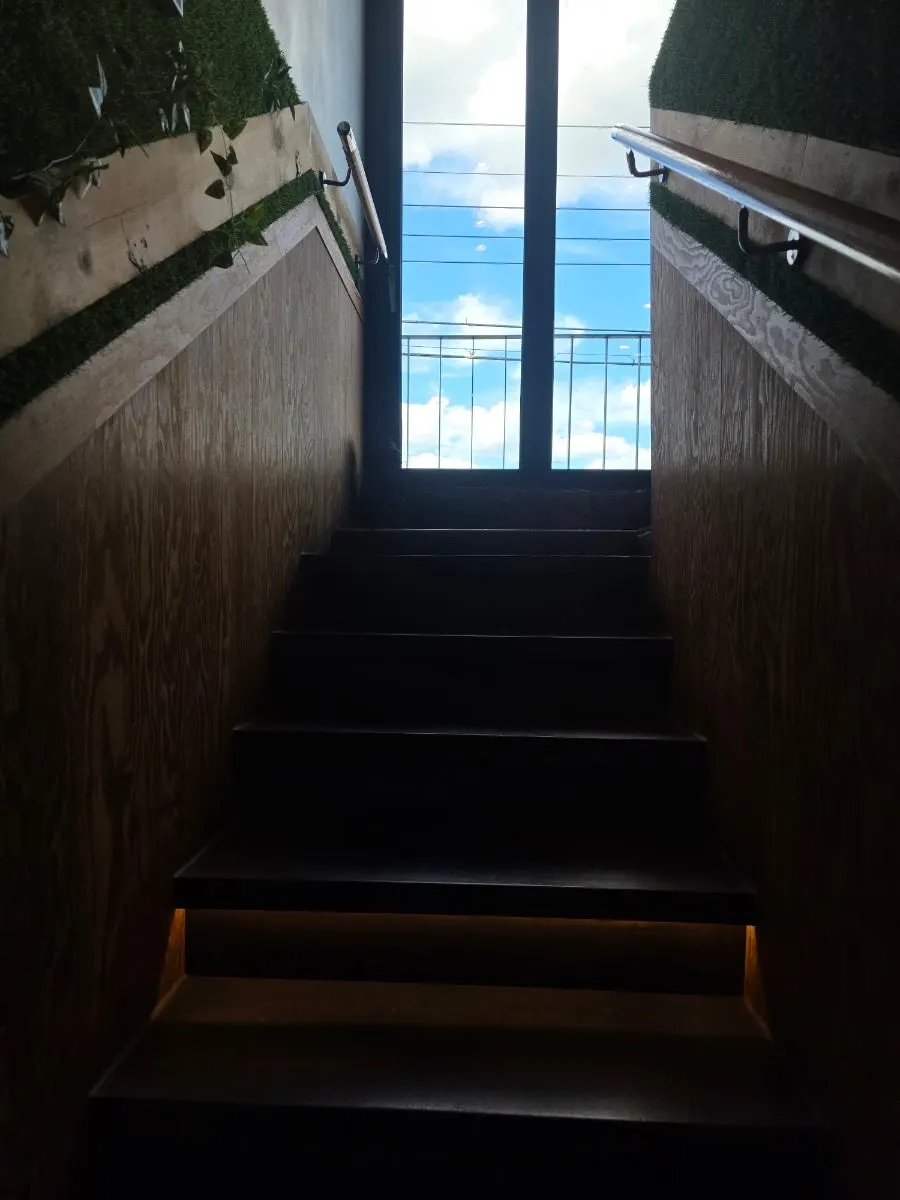 Spacious restaurant interior extending to the second floor