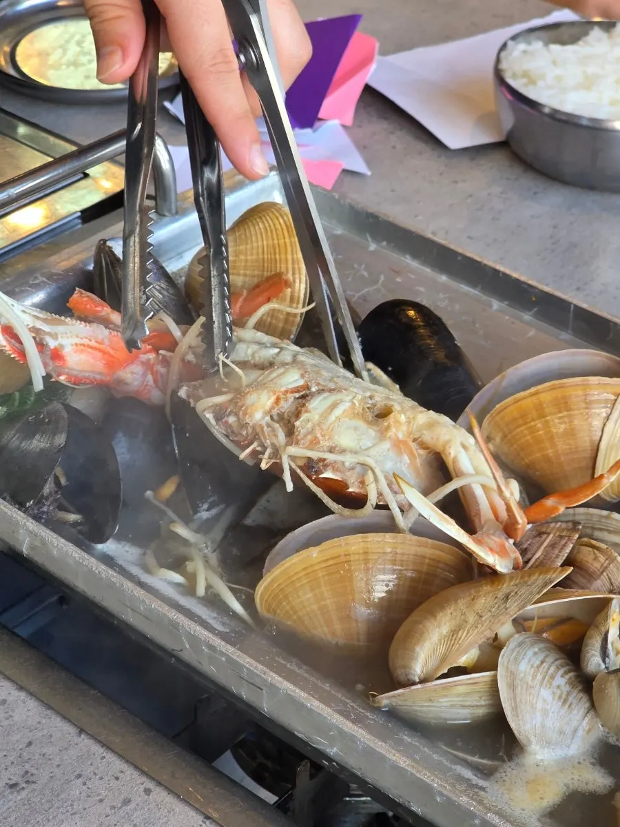 Kalguksu with seafood and vegetables