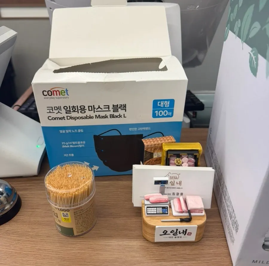 Mouthwash, fabric deodorizer, and masks placed at the exit