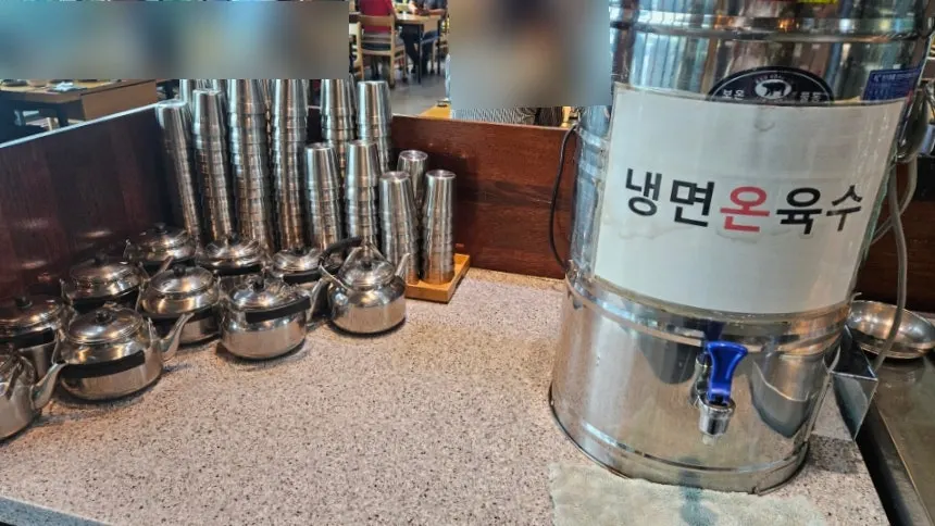 Warm broth and kimchi at the self-serve bar