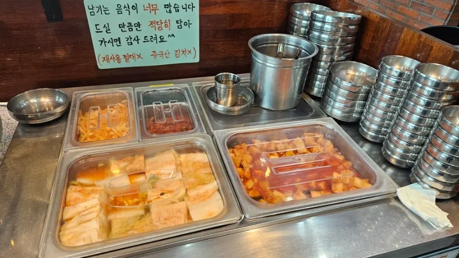 Side dishes and salted squid at the self-serve bar