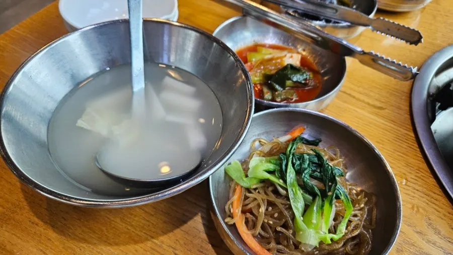 A tender piece of raw hanwoo bulgogi