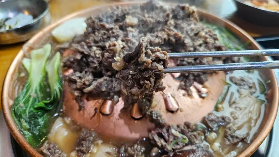 Bulgogi mixed with mushrooms and glass noodles