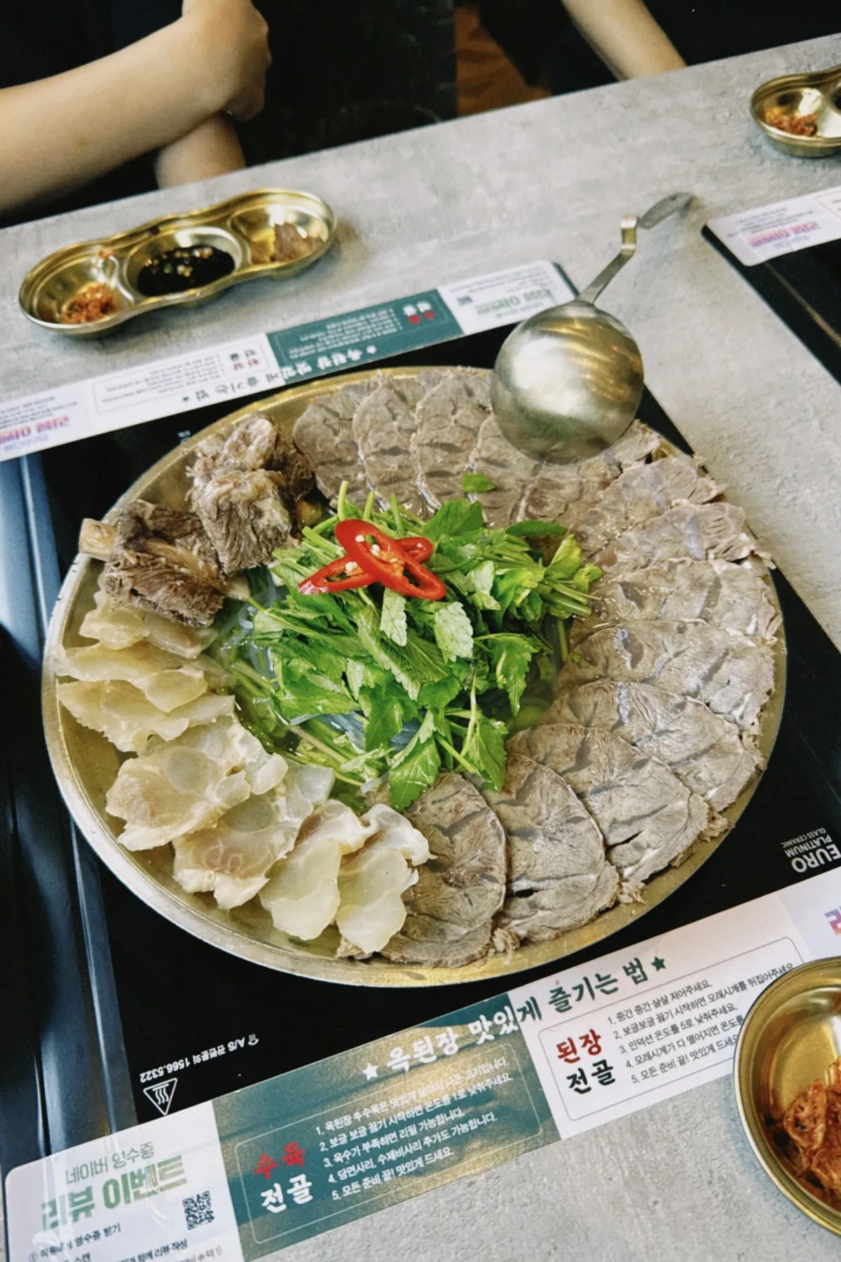 Assorted boiled pork hot pot starting to boil