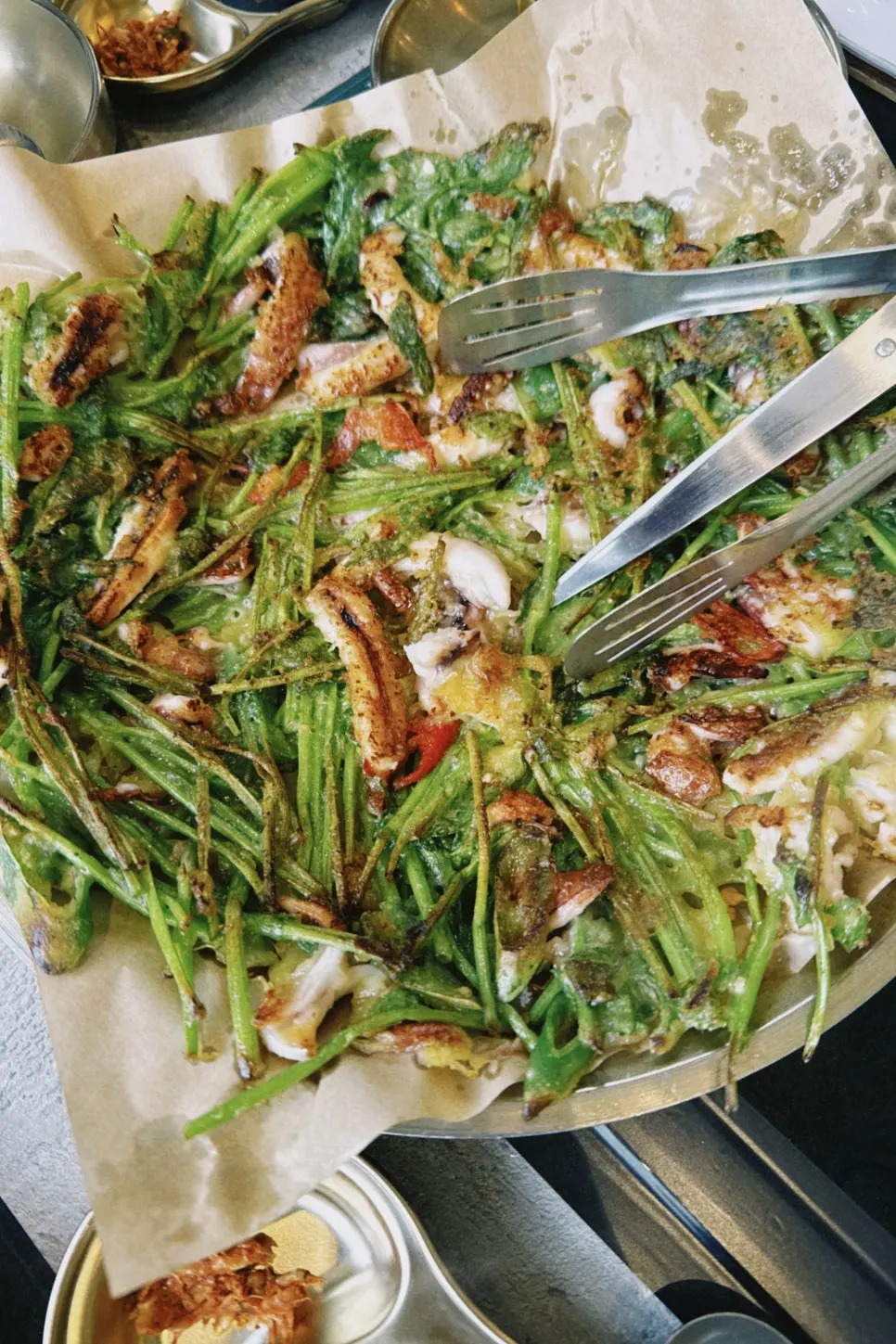 Wide squid-minari pancake served whole