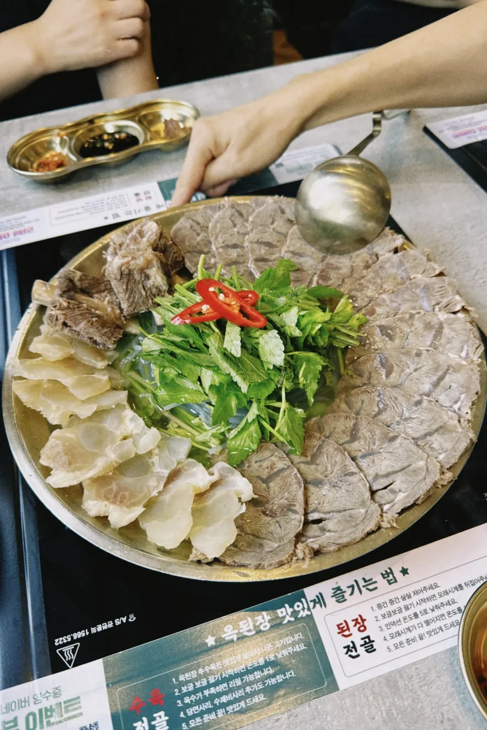 Three friends sharing the feast set for three