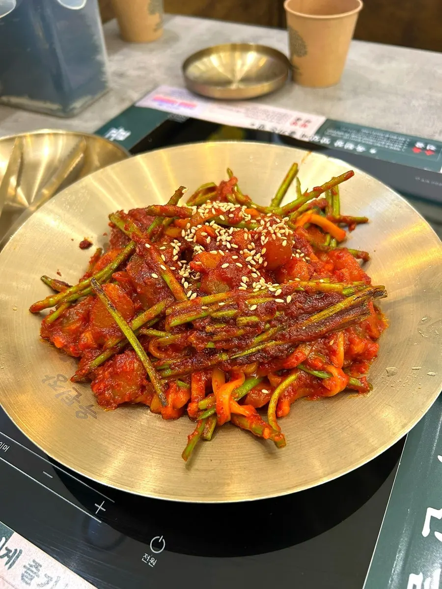 Bulssuji stir-fry with kalguksu noodles added