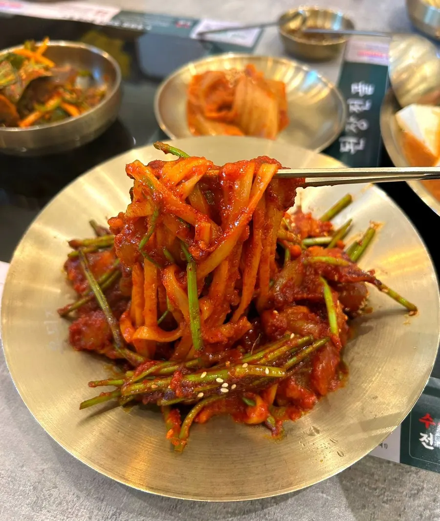 Chewy beef tendon visible in the bulssuji stir-fry