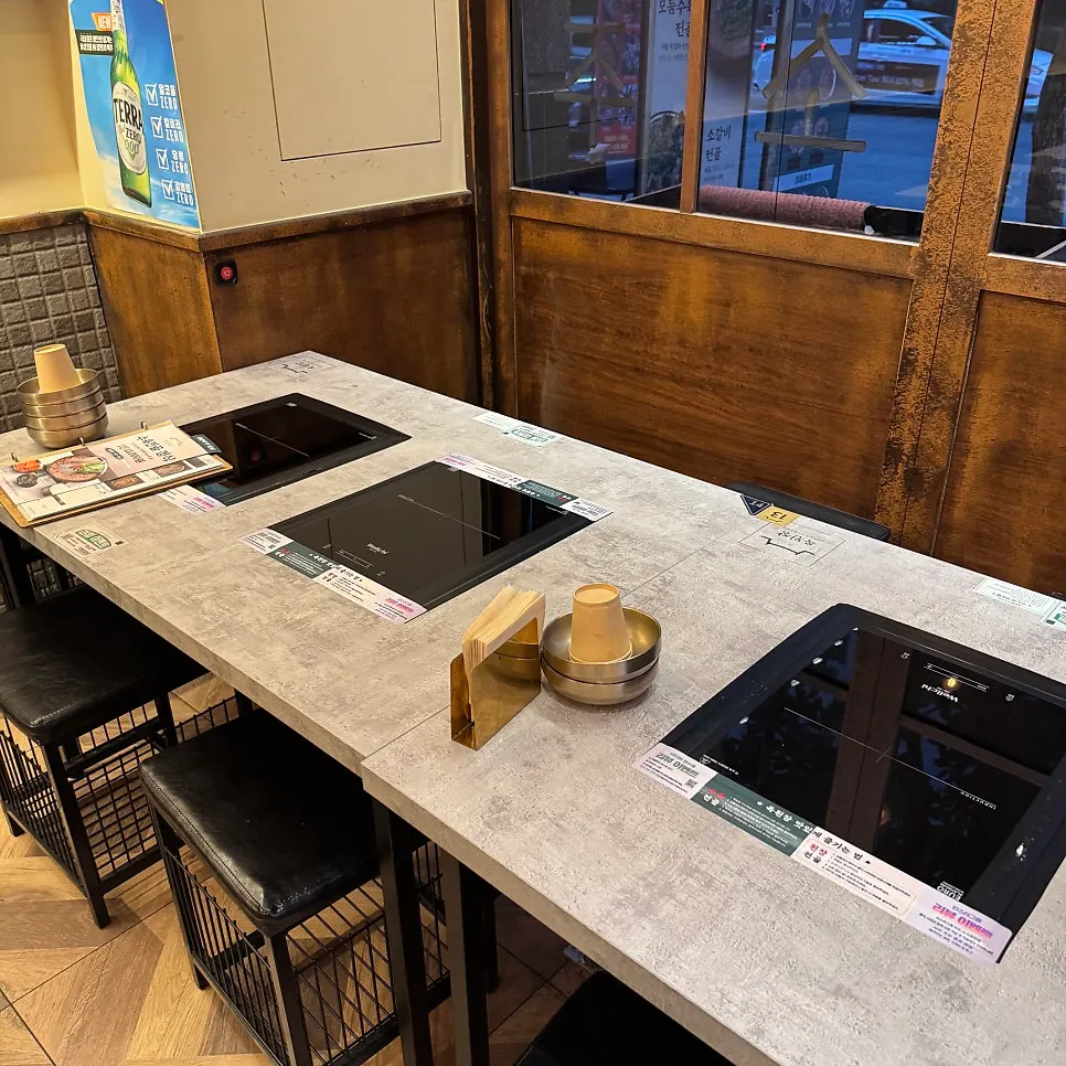 Spacious dining hall with generous gaps between seats