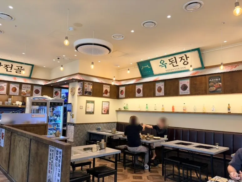 Rows of tables inside Ok Doenjang's dining room