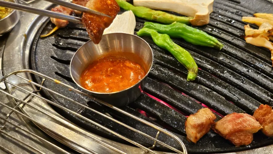 Meat served with myeonginamul and pickles