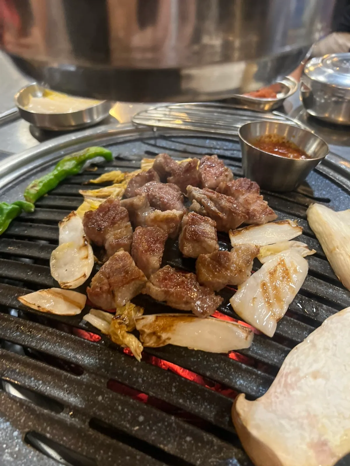 Charcoal-grilled pork paired with baekgimchi