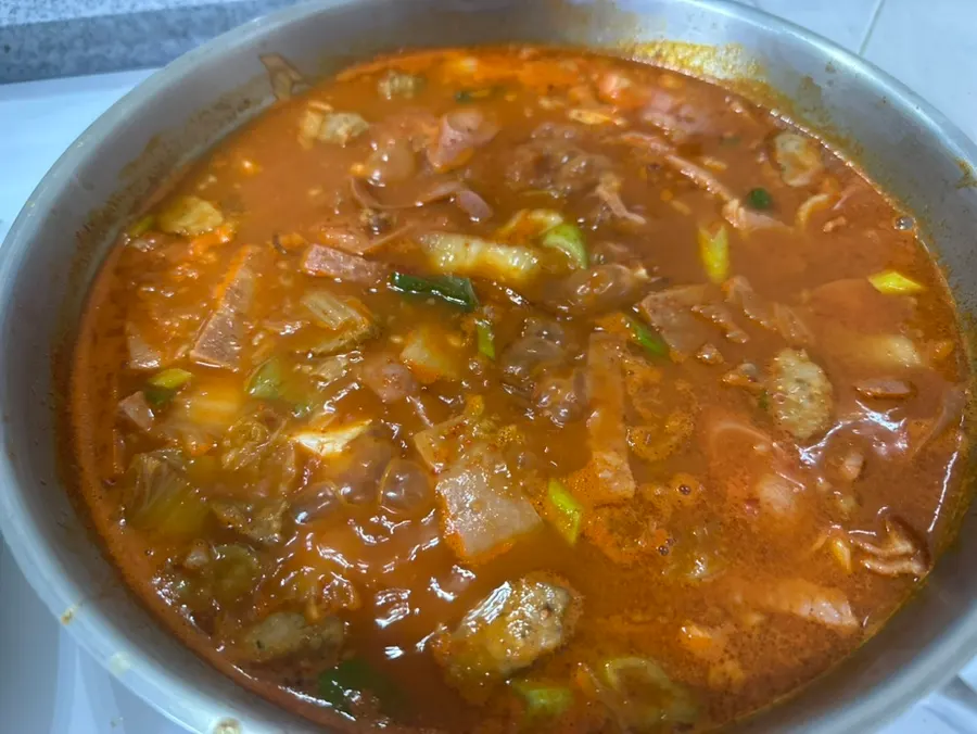 Budae-jjigae boiling as the seasoning dissolves