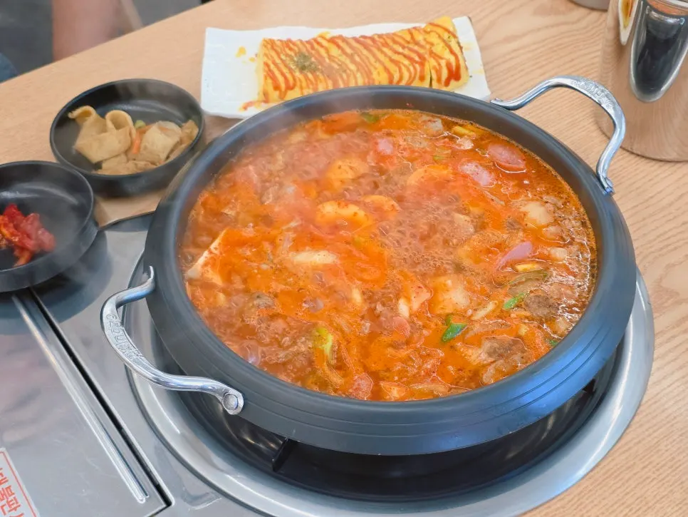 Table set with two servings of budae-jjigae