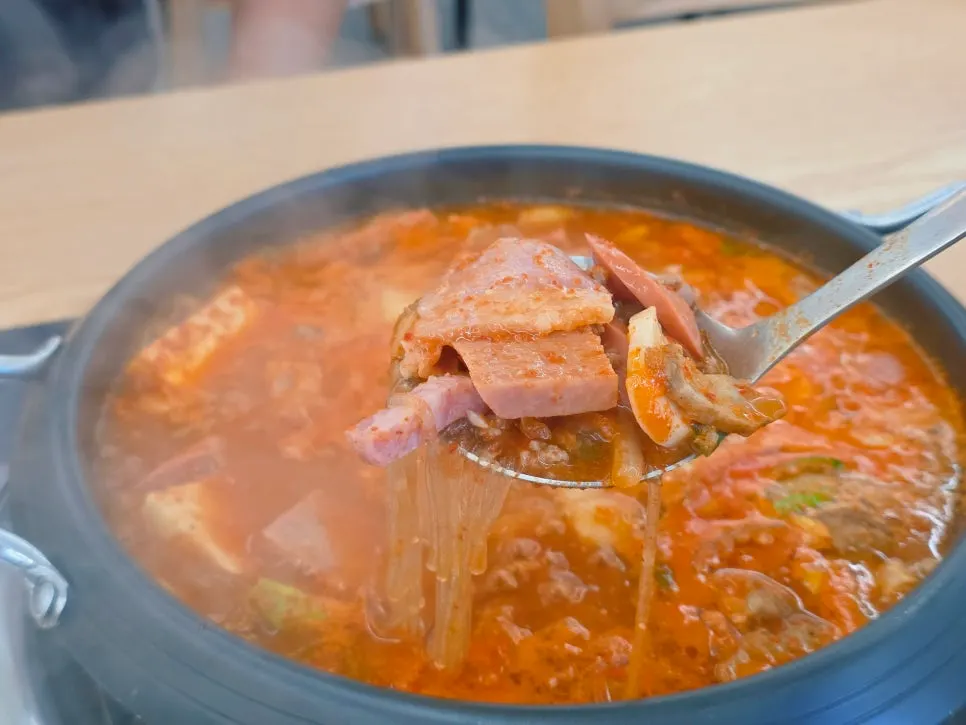 Budae-jjigae ingredients packed with ham and sausage