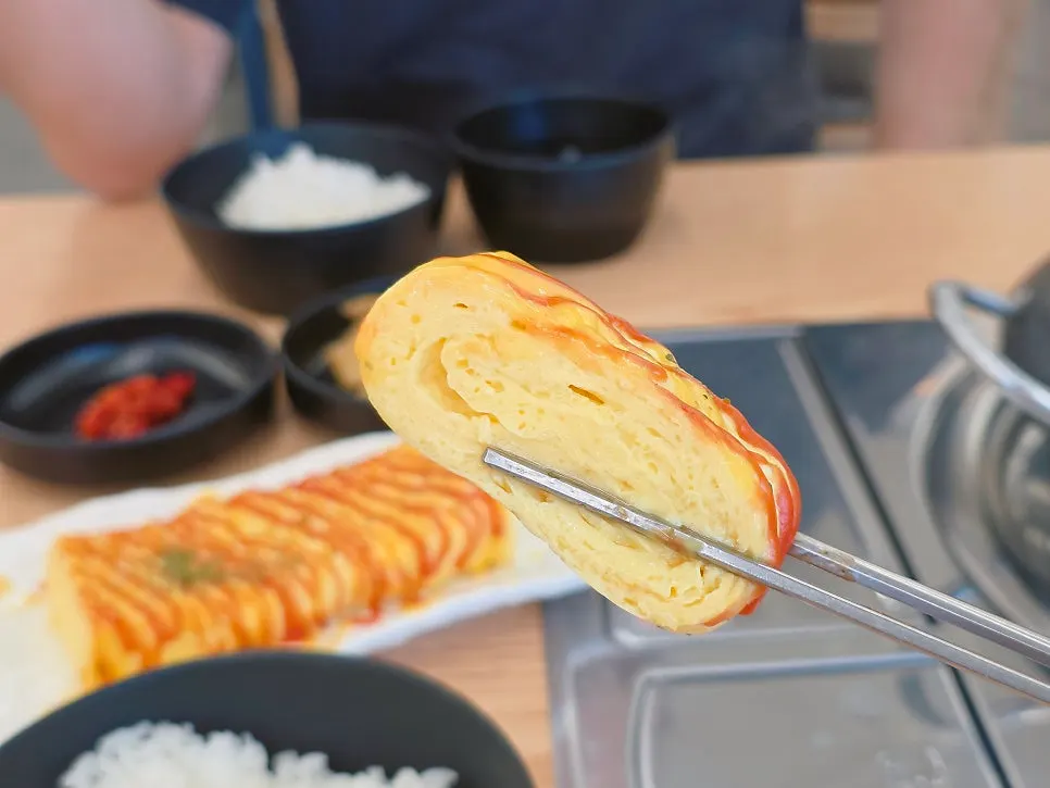 Plate of long, thick egg roll