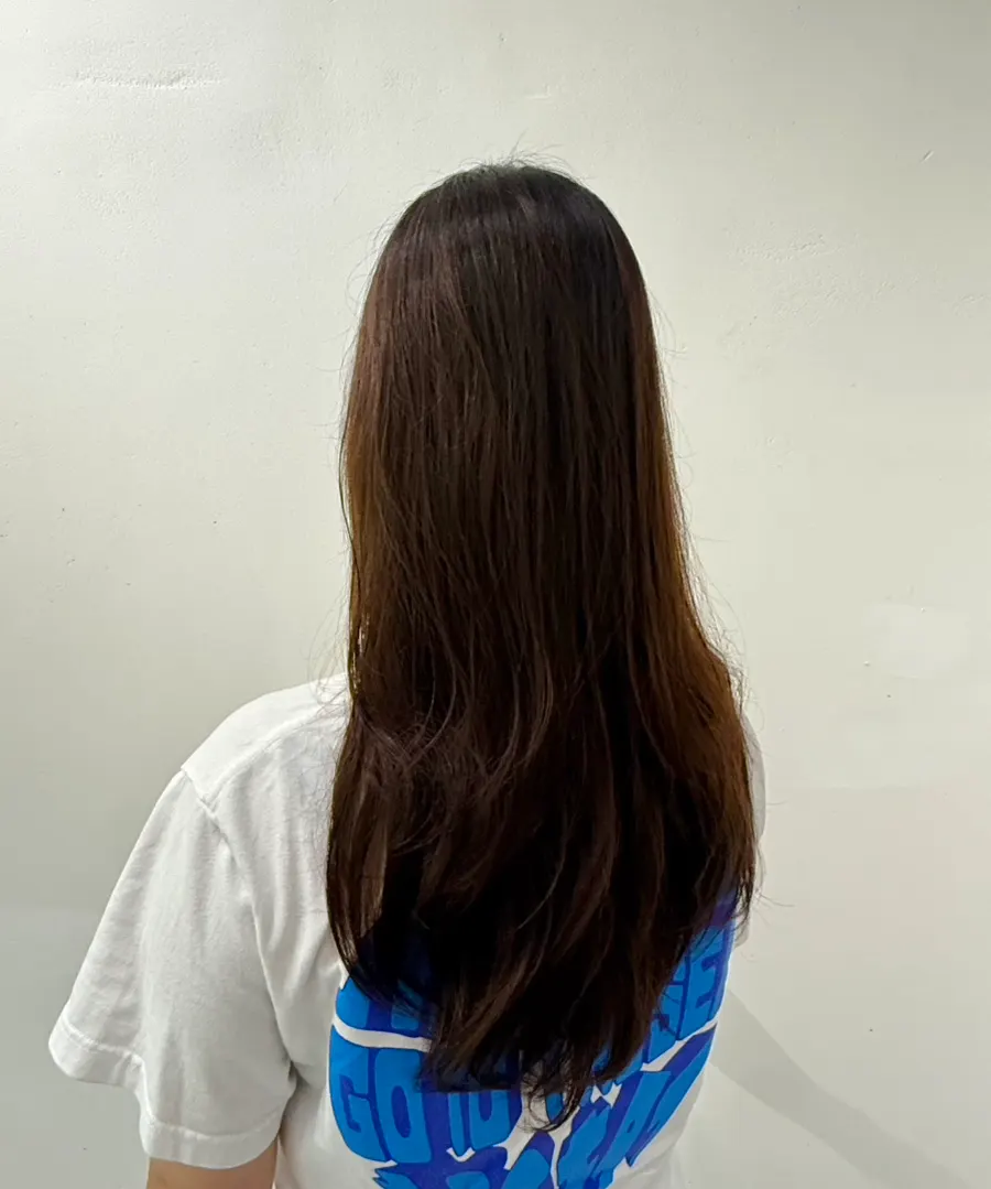 Close-up of the finished C-curl perm texture