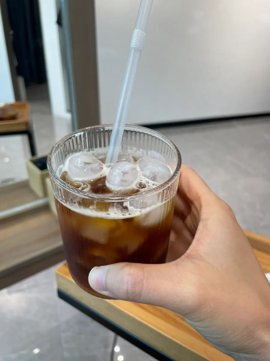 Iced Americano enjoyed during the service