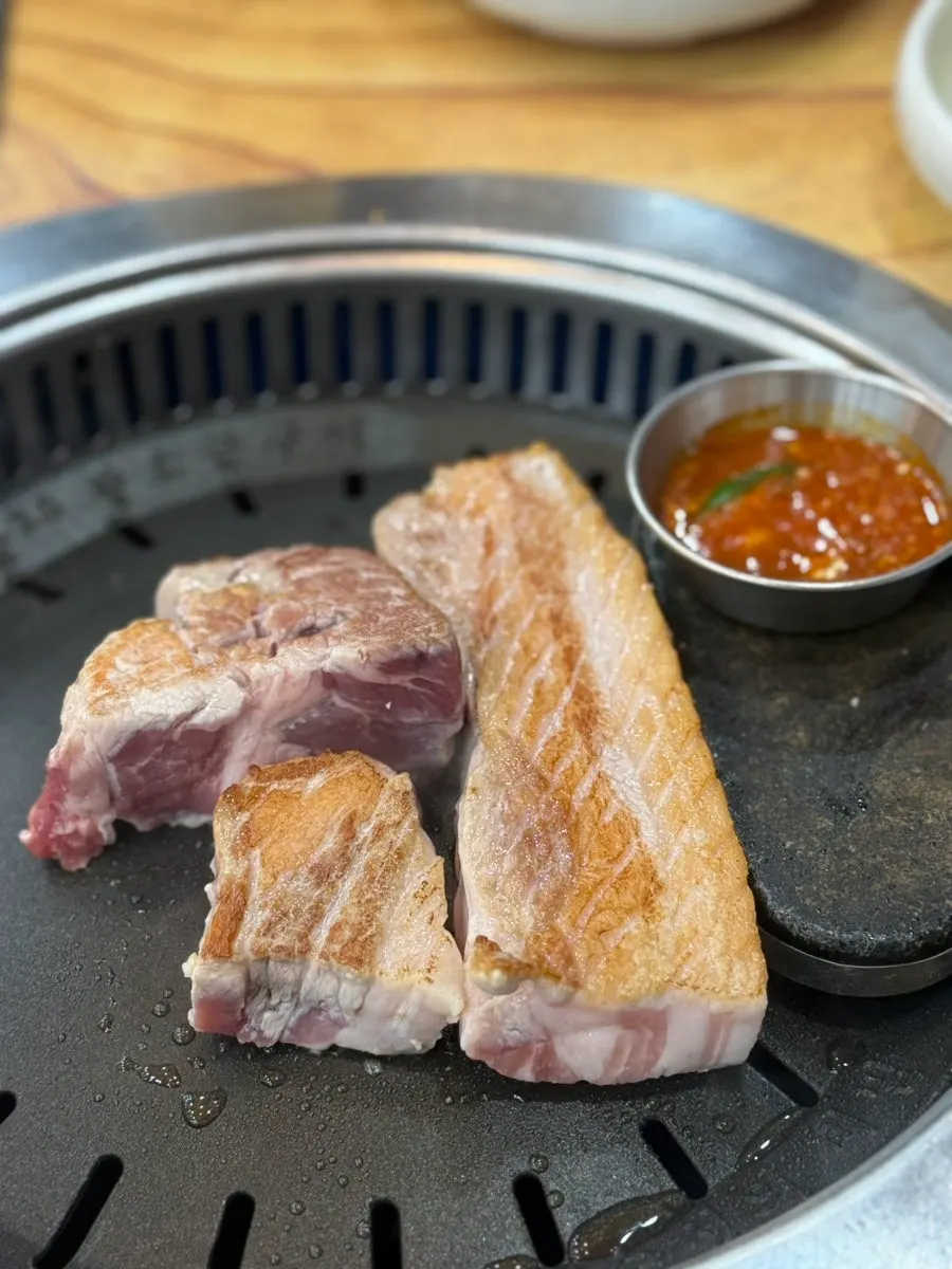Aged meat browning nicely on the grill