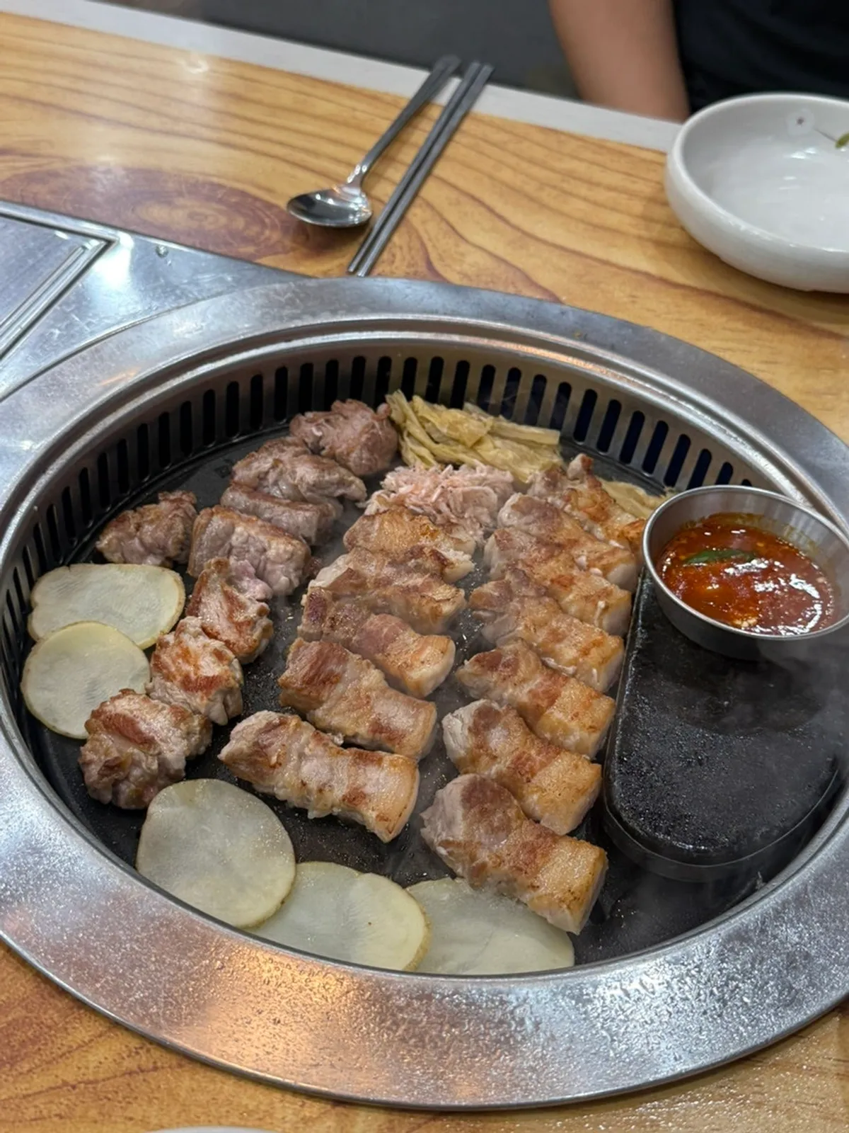 Grilled pork belly cut into bite-sized pieces