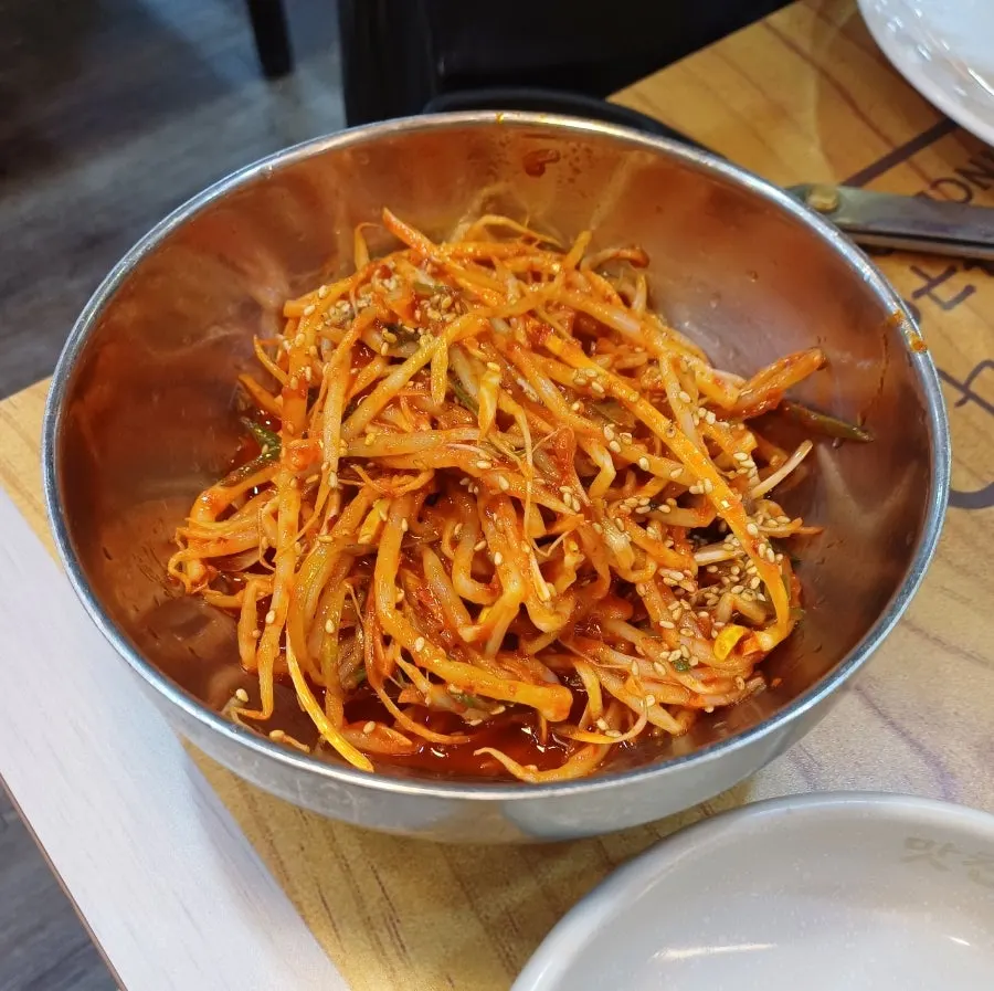 Wasabi, salted pollock roe, sauce, and bean sprout scallion side dishes