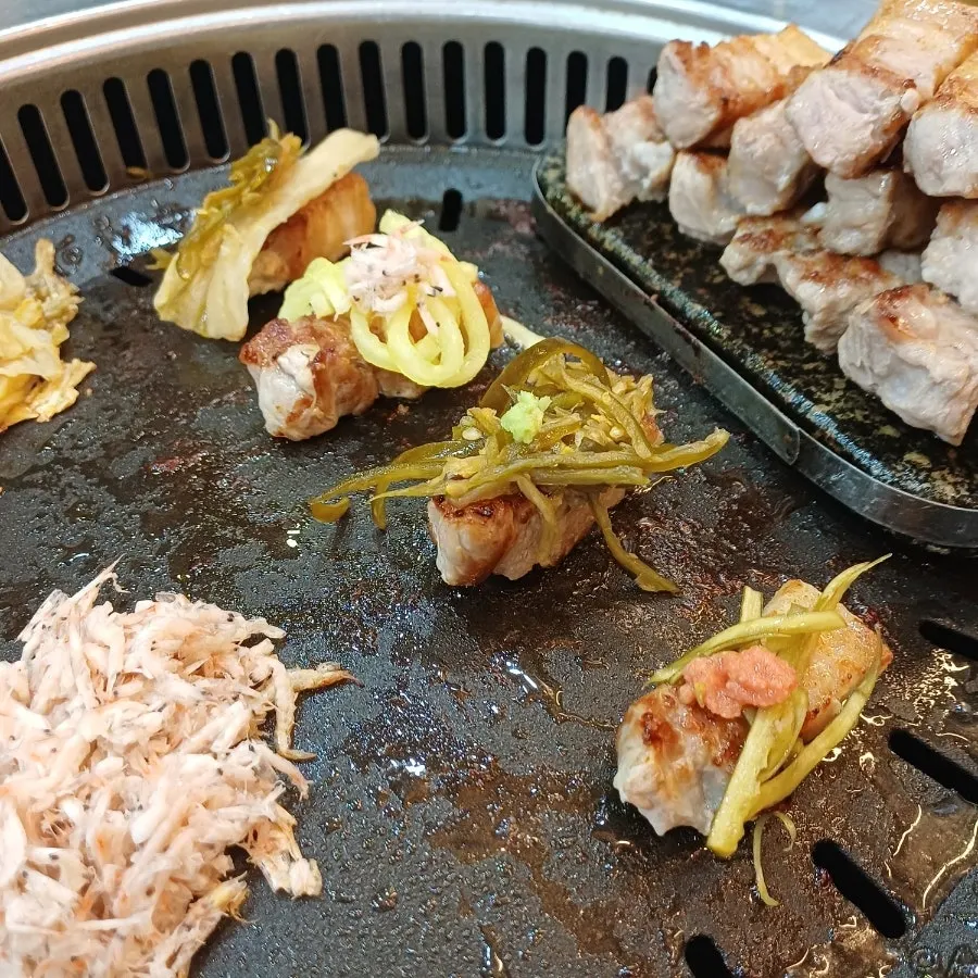 A single piece of pork belly set up with four different combos
