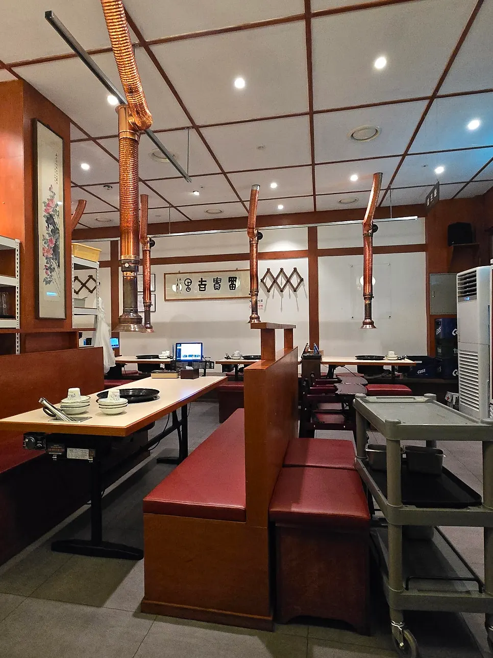 Interior with a retro atmosphere featuring red sofas
