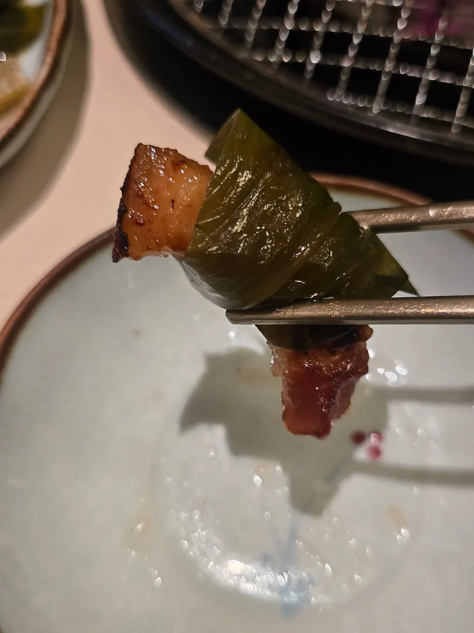 Yuzu-aged kkodeulsal wrapped in myeongi-namul