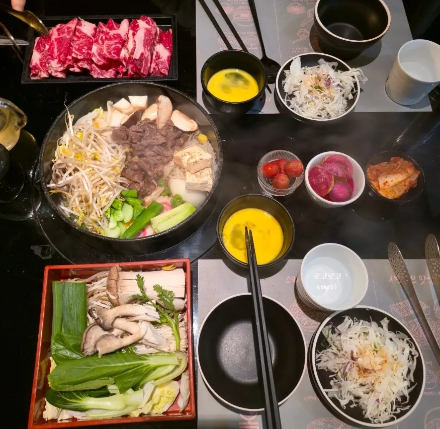 Plate of sukiyaki beef and vegetables