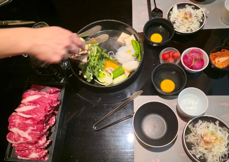 Sukiyaki pot cooked by staff
