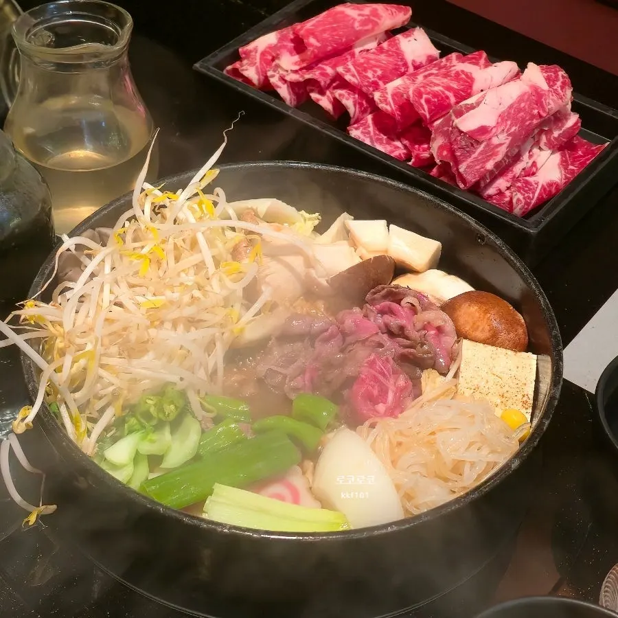Sukiyaki cooking in the soy-based broth