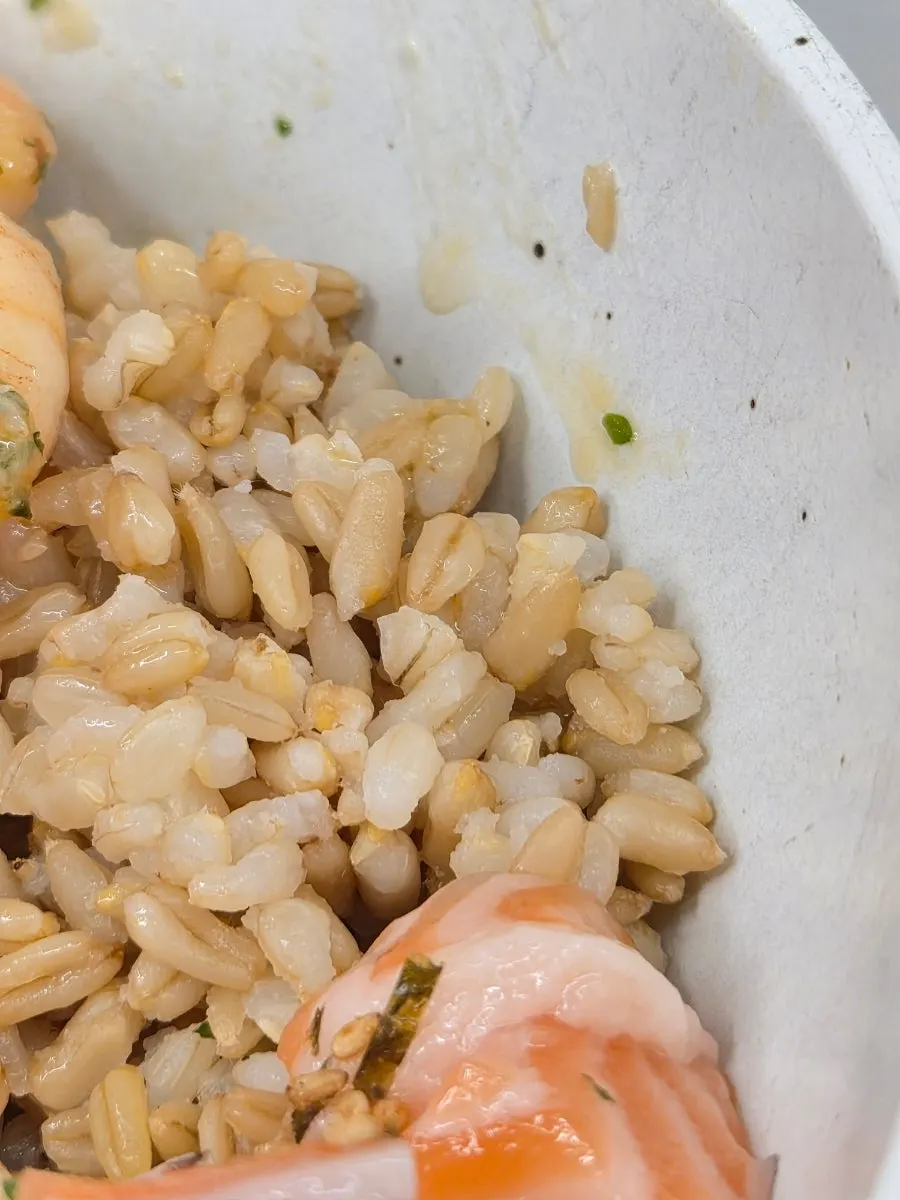 A filling poke bowl topped with salmon and shrimp