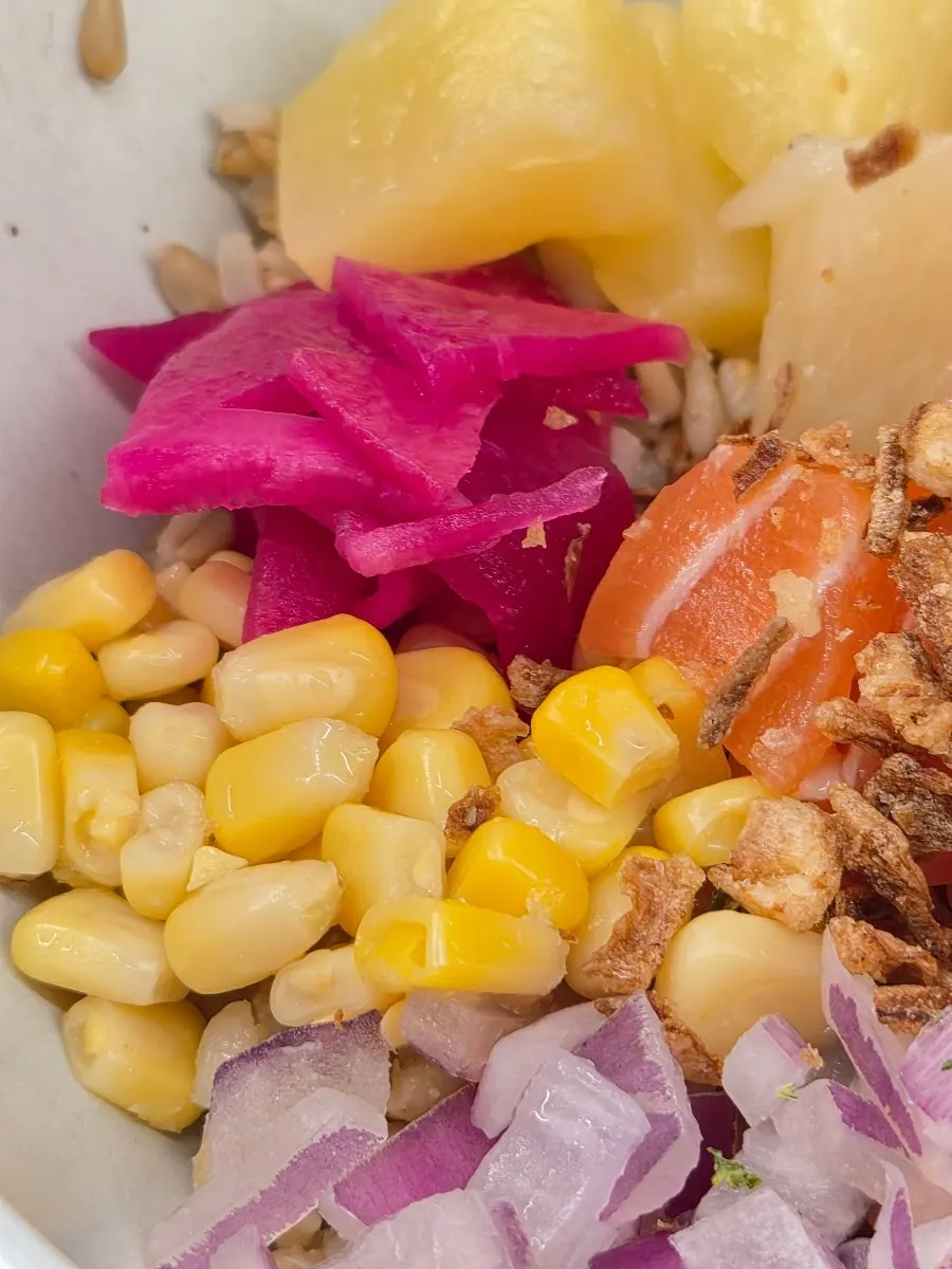Cross-section of poke with rice and vegetables