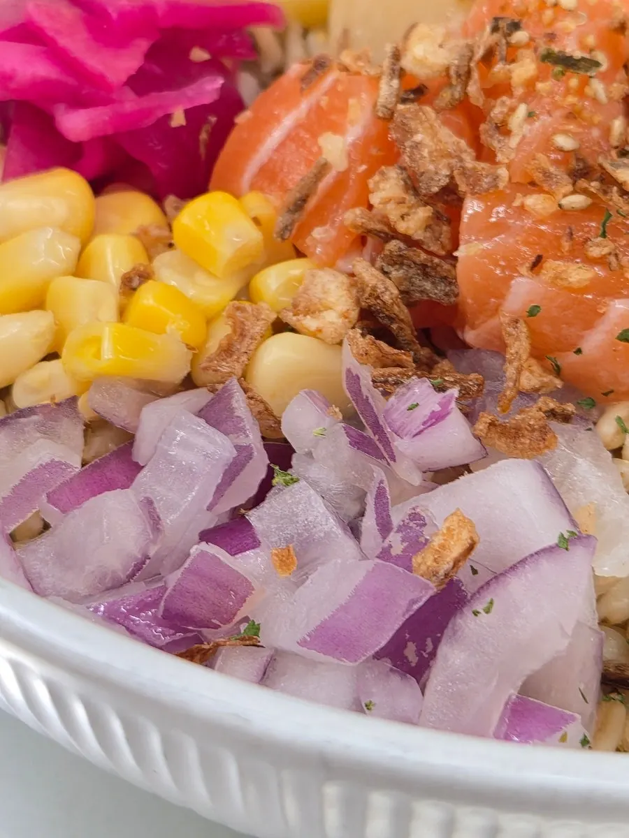 Close-up of soft salmon and shrimp toppings