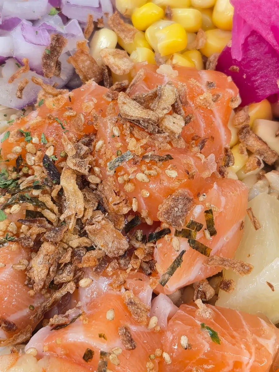Poke with both soy sauce and chili garlic sauce