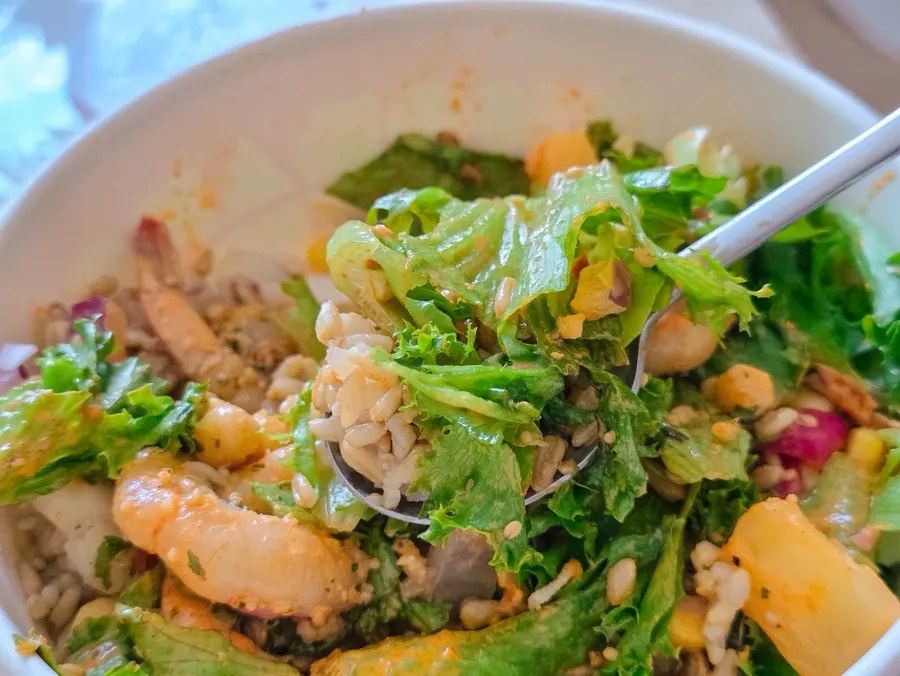 Salmon poke and garlic shrimp poke eaten together at home