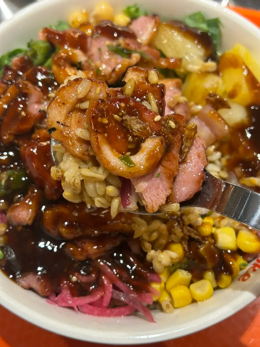 Close-up of the generous smoked duck poke portion